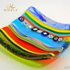 Fine art glass works may consist of colorful dishes