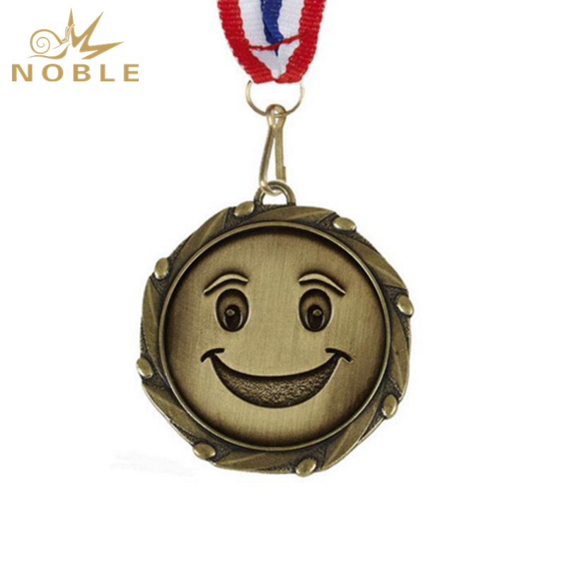 Happy Face Medal Gold With White Blue & Red Ribbon 
