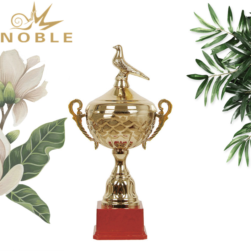 Shiny Gold Metal Bird Figurine Trophy with Red Plastic Base