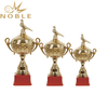 Shiny Gold Metal Bird Figurine Trophy with Red Plastic Base