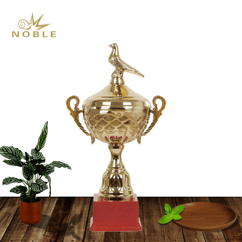Shiny Gold Metal Bird Figurine Trophy with Red Plastic Base