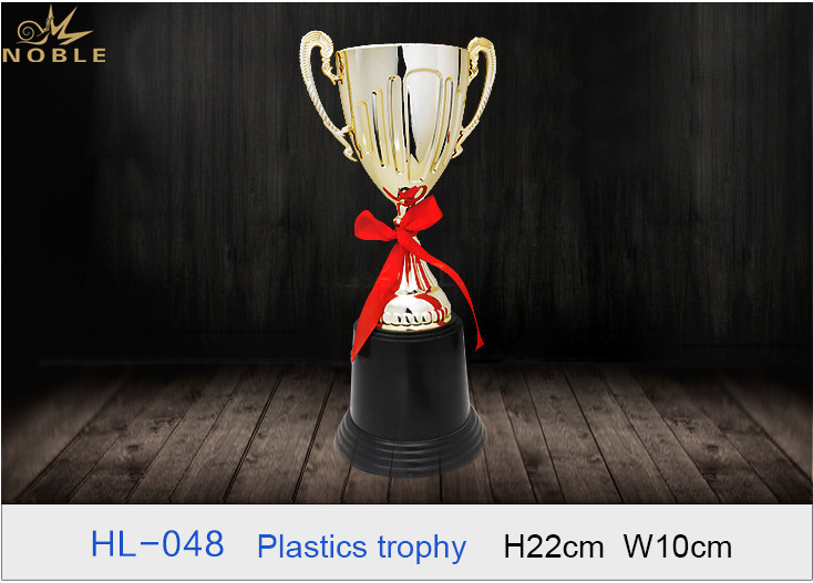 Hot Selling Low Price Plastic Trophy Cup Award with Red Ribbon